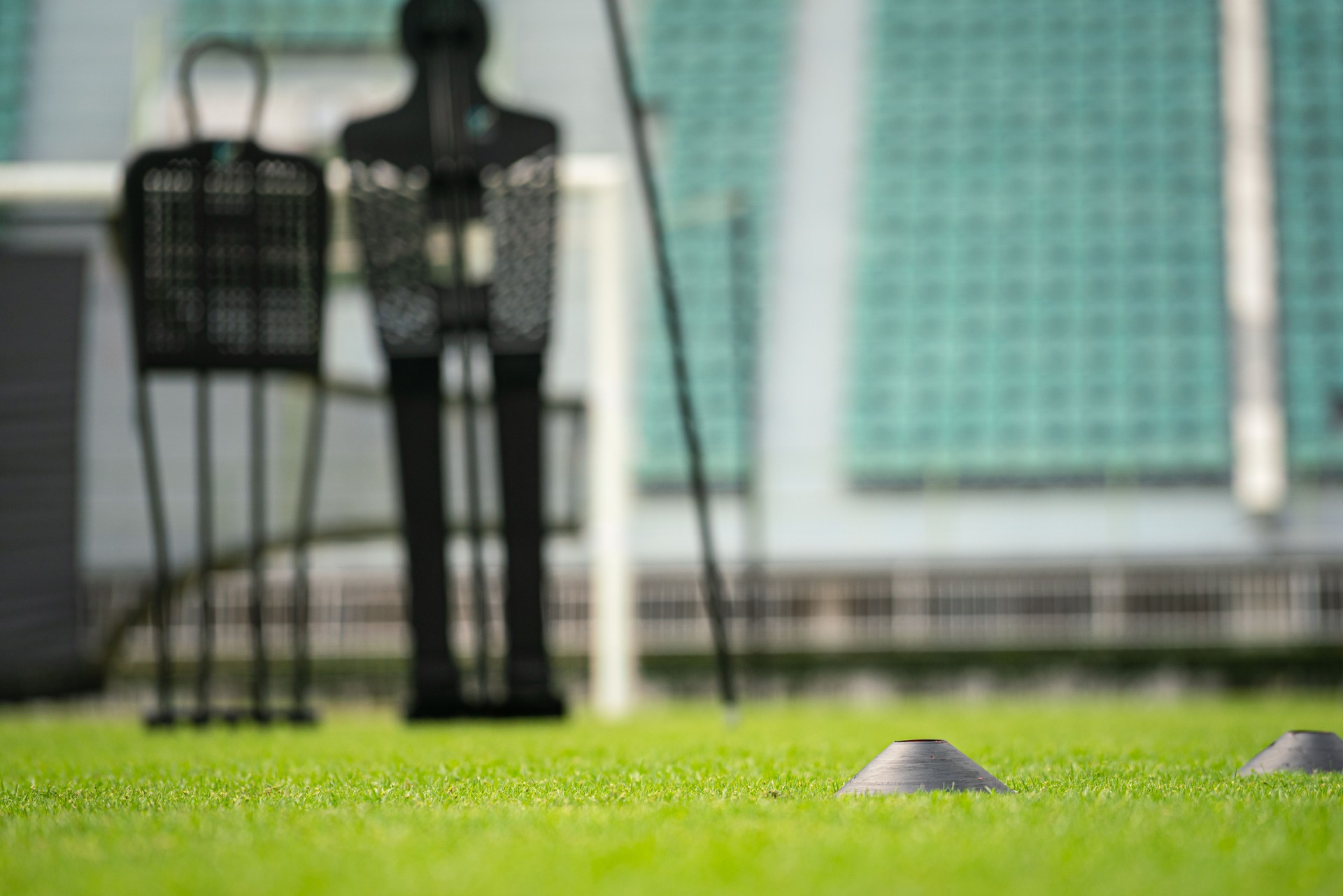 Professional football training set-up on pitch.